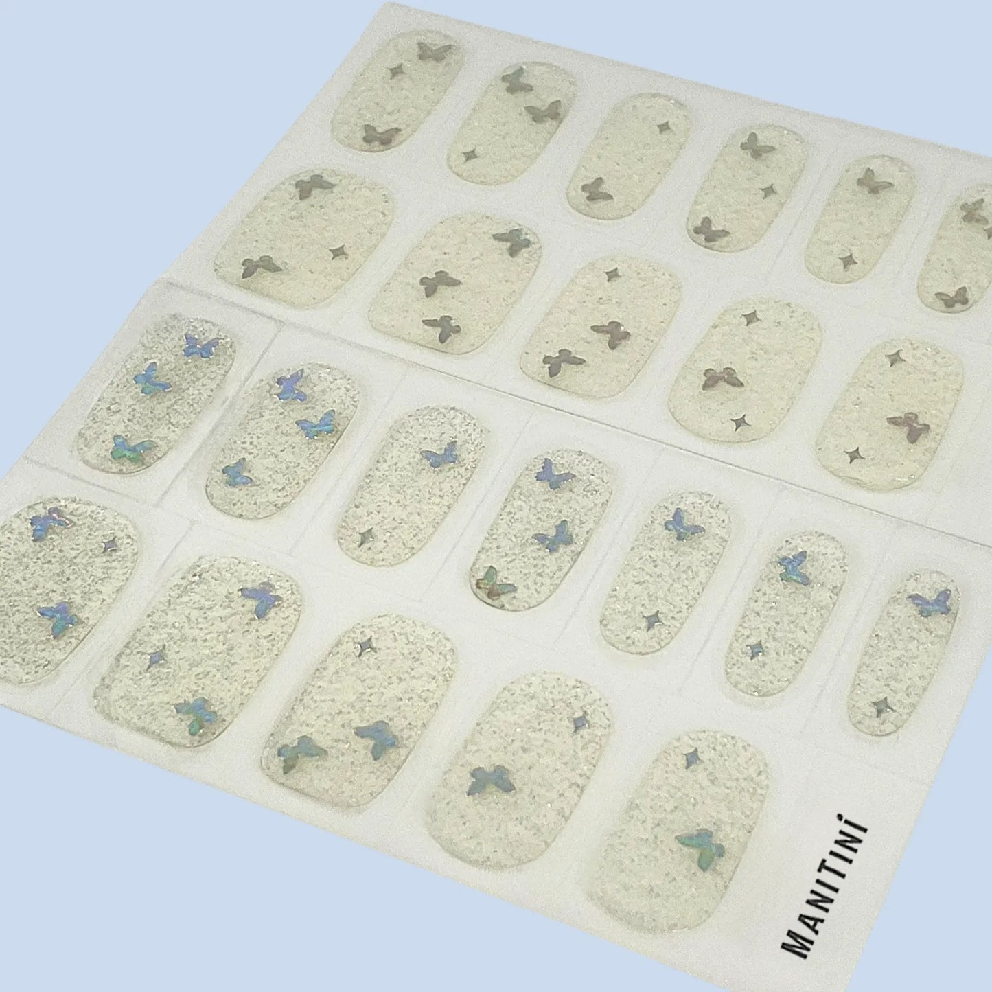 Butterfly Amour - transparent and shimmer nail wraps with silver butterfly patterns | ManiTini