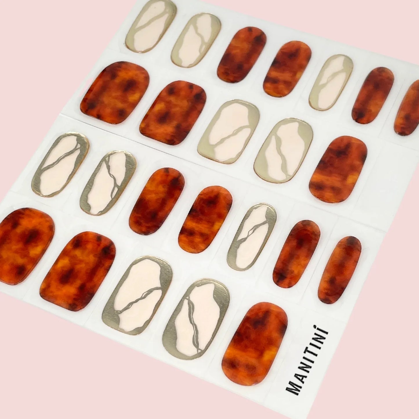 Mahogany Affection - reddish brown art nail wraps with irregular golden pattern | ManiTini