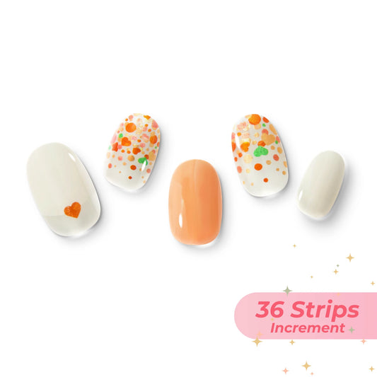 The gel nail wraps of ManiTini 'Champagne Bubblescape' showcasing lively orange hearts and bubbles ascend in the enchanted Champagne, whisking you away to a dreamy world of whimsy and wonder.