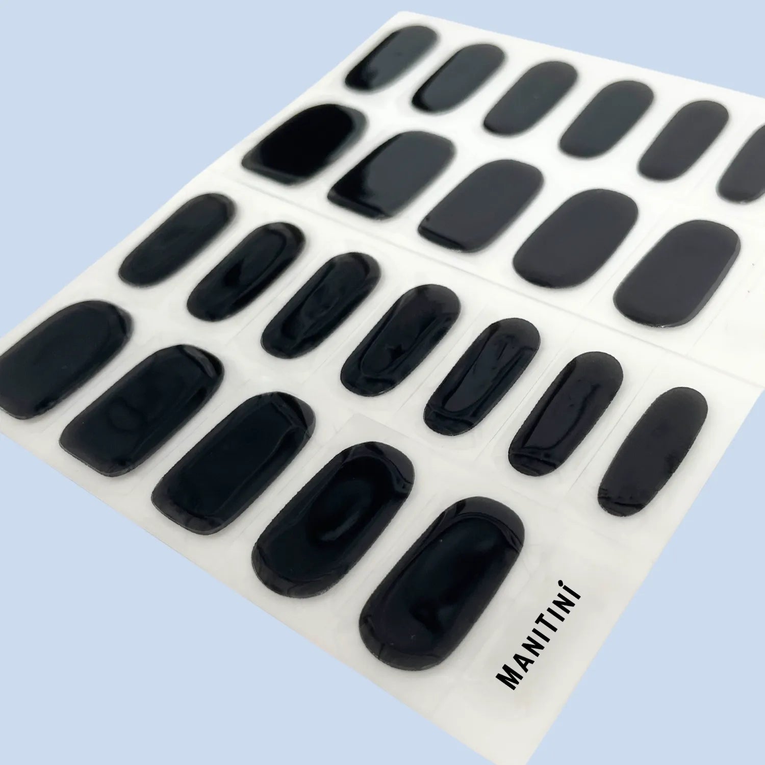 Sublime Noir - cool-chic and solid black art nail wraps | ManiTini 