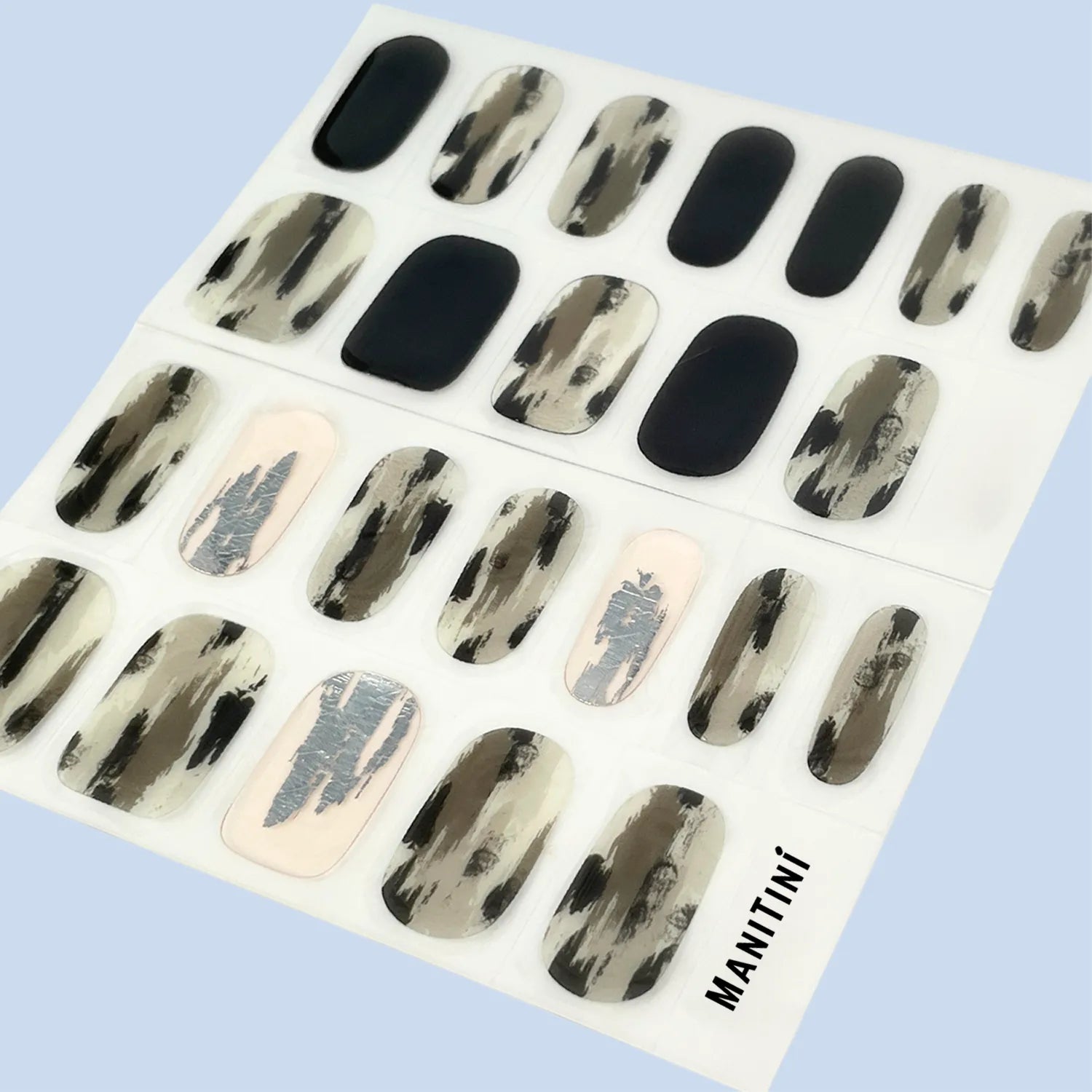 Maverick Echo - black stokes and silver shimmering art nail wraps | ManiTini 