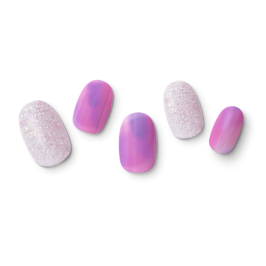 The gel nail wraps of ManiTini 'Purple Finch' showcasing a Purple Finch spreading its wings, blooming with different purple tones from lavender to deep amethyst.