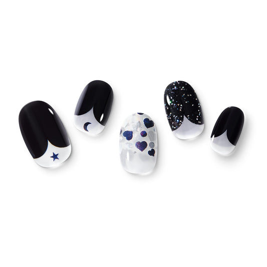 The gel nail wraps of ManiTini 'Playful Poker' showcasing walking into a poker party, turning hearts into unfathomable black hearts.