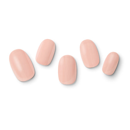 The gel nail wraps of ManiTini 'Whispering Pink Rose' showcasing a soft pink hue, evoking a sense of understated beauty and feminine allure.