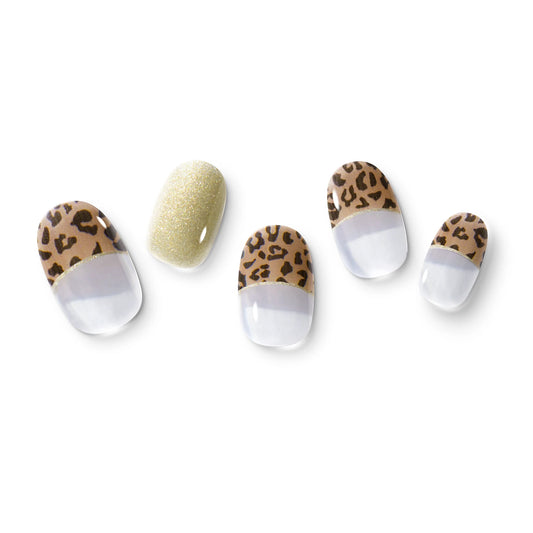 The gel nail wraps of ManiTini 'Leopard's Roar' showcasing the domain of the Wonder Leopard, where fierce elegance of the wild meets untamed beauty with its mesmerizing spots and regal allure.