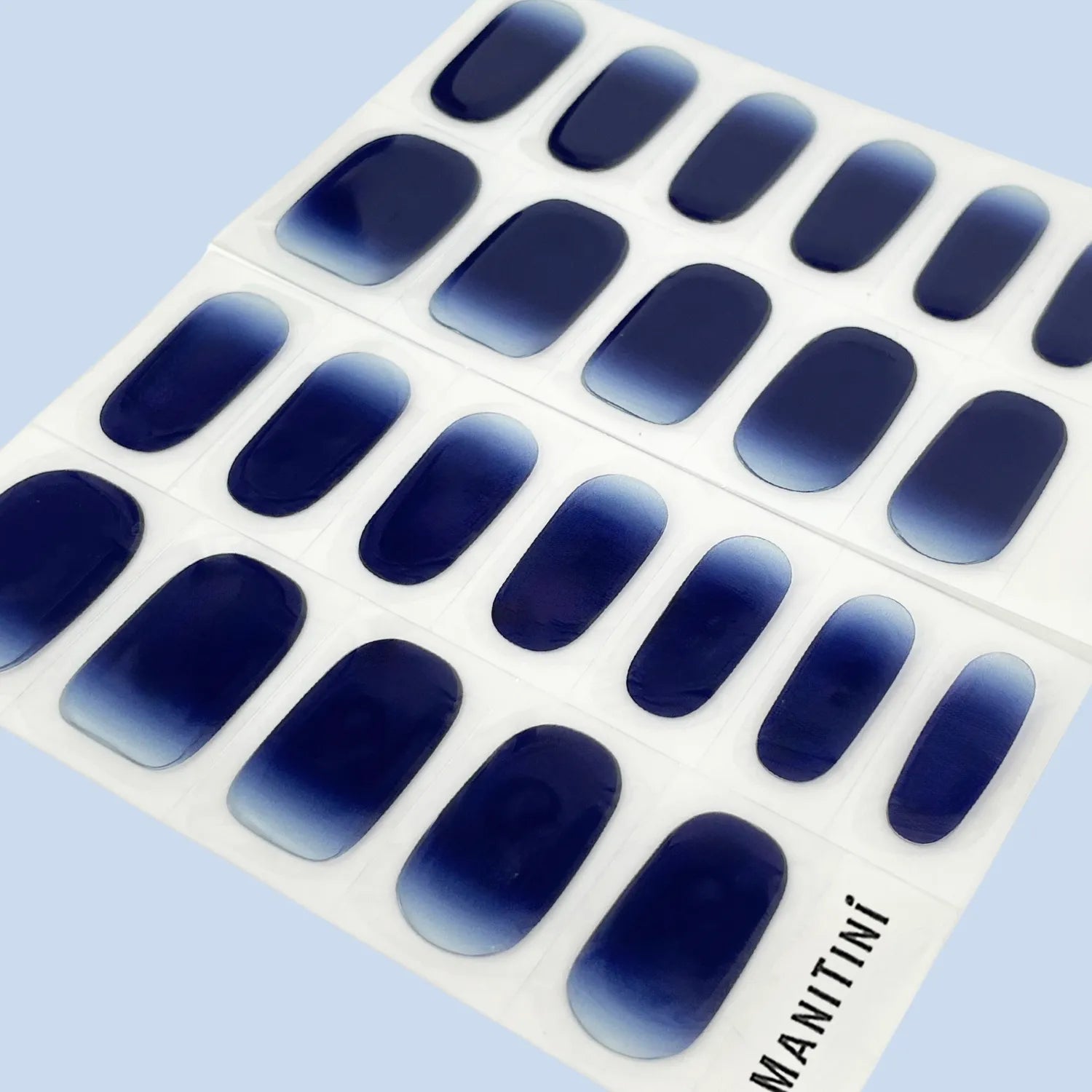 Pacific Charm - deep blue art nail wraps | ManiTini 